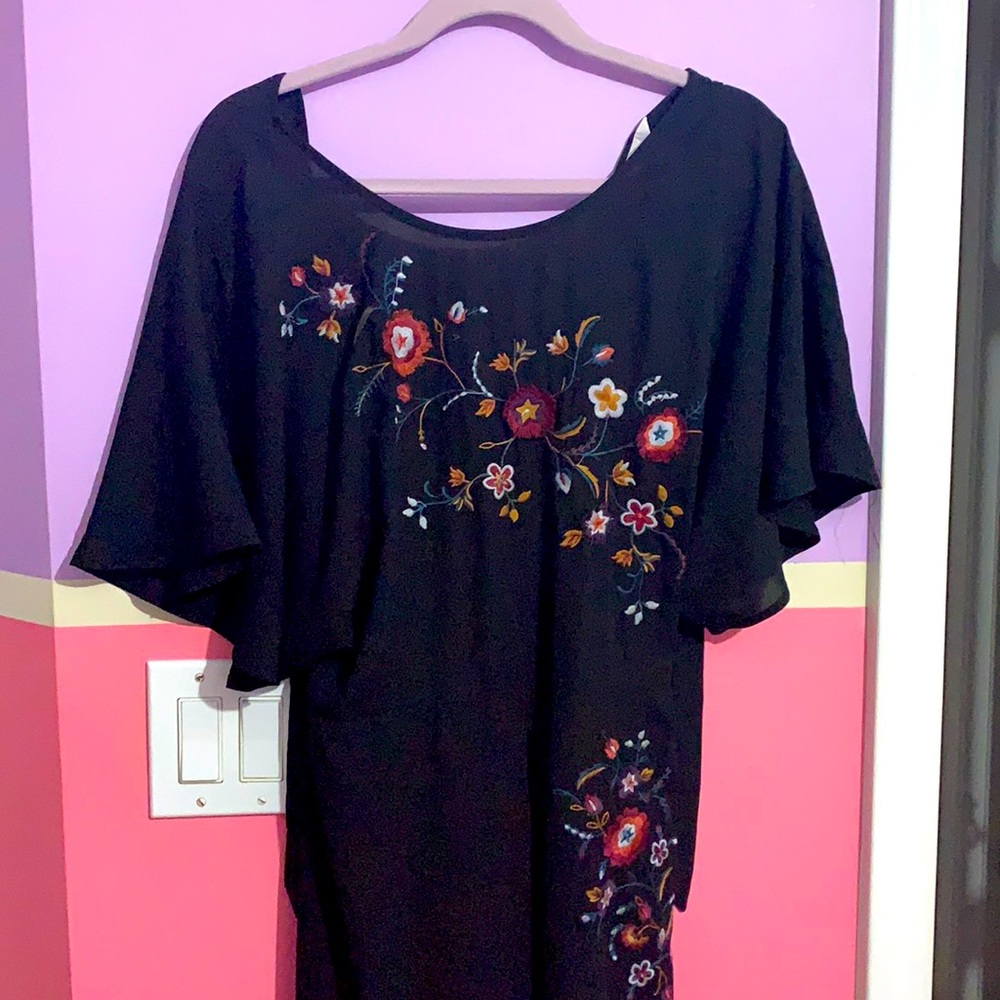 Floral jumpsuit from Charming Charlie’s with short flare sleeves and wide legs